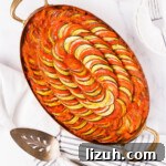 Classic French Ratatouille Recipe: How to Make Authentic Provençal Stew 26 Top down of a baked ratatouille in an oval pan.