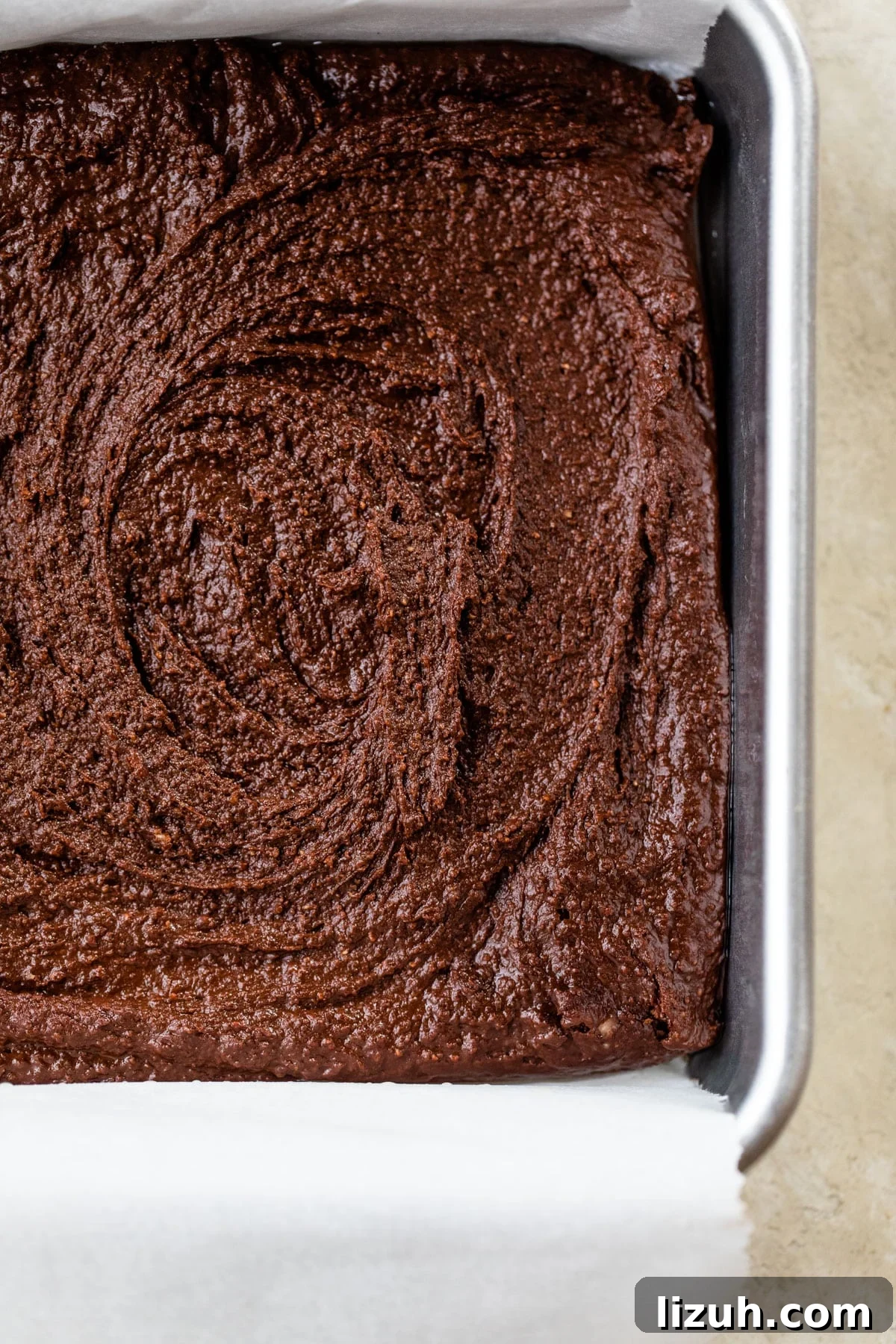 Decadent Chickpea Brownies Recipe — Fudgy, Gluten-Free Treat 4 brownie batter in a baking pan