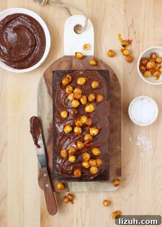 Gianduja Ganache Chocolate Loaf Cake Recipe 2 Chocolate Loaf Cake with Gianduja Ganache and Caramelized Hazelnuts // FoodNouveau.com