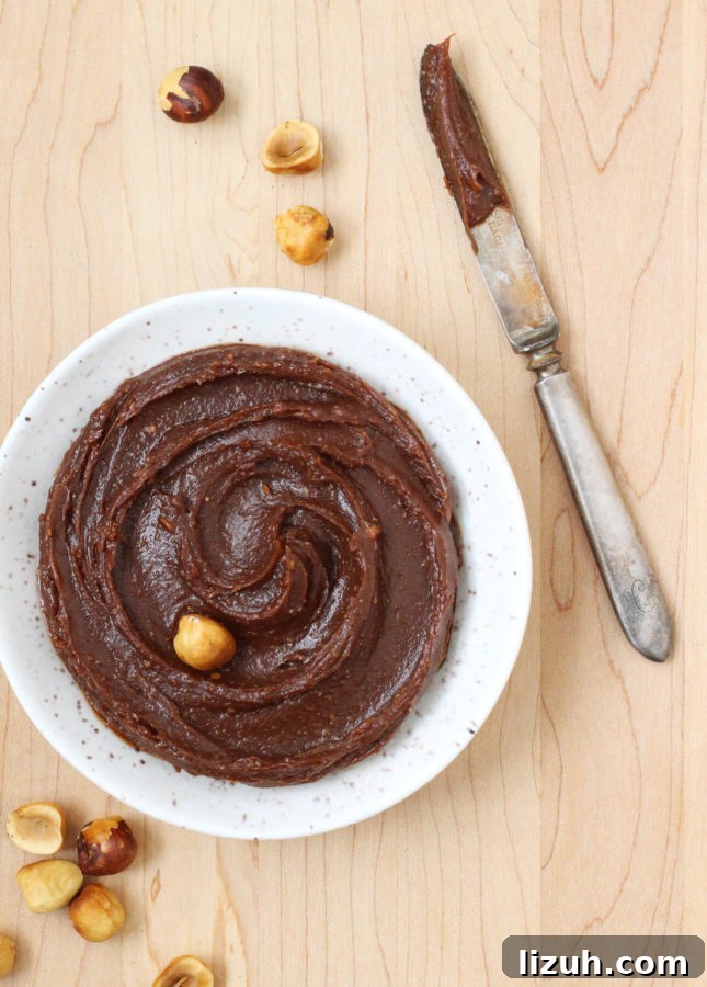 Gianduja Ganache Chocolate Loaf Cake Recipe 7 Chocolate Loaf Cake with Gianduja Ganache and Caramelized Hazelnuts // FoodNouveau.com