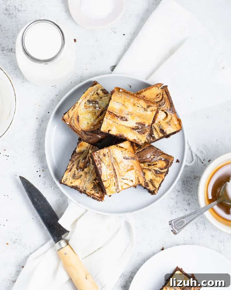 overhead view of salted caramel cheesecake brownies