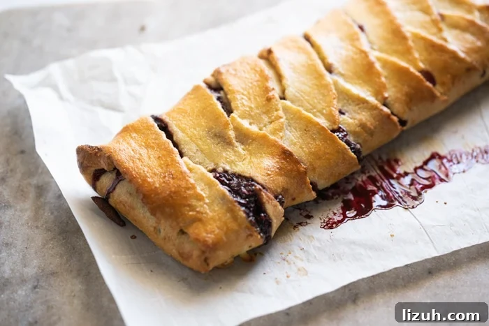 Freshly baked keto danish braid on parchment paper
