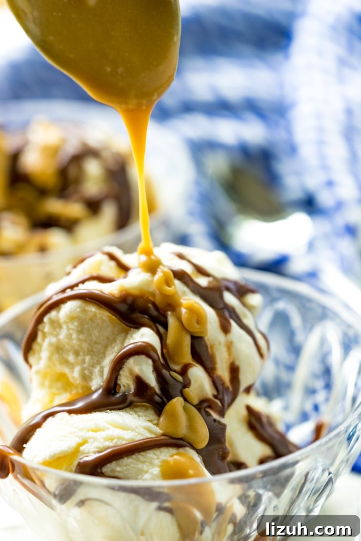 Homemade hot fudge and butterscotch over vanilla ice cream Homemade hot fudge sauce and homemade butterscotch sauce on vanilla ice cream