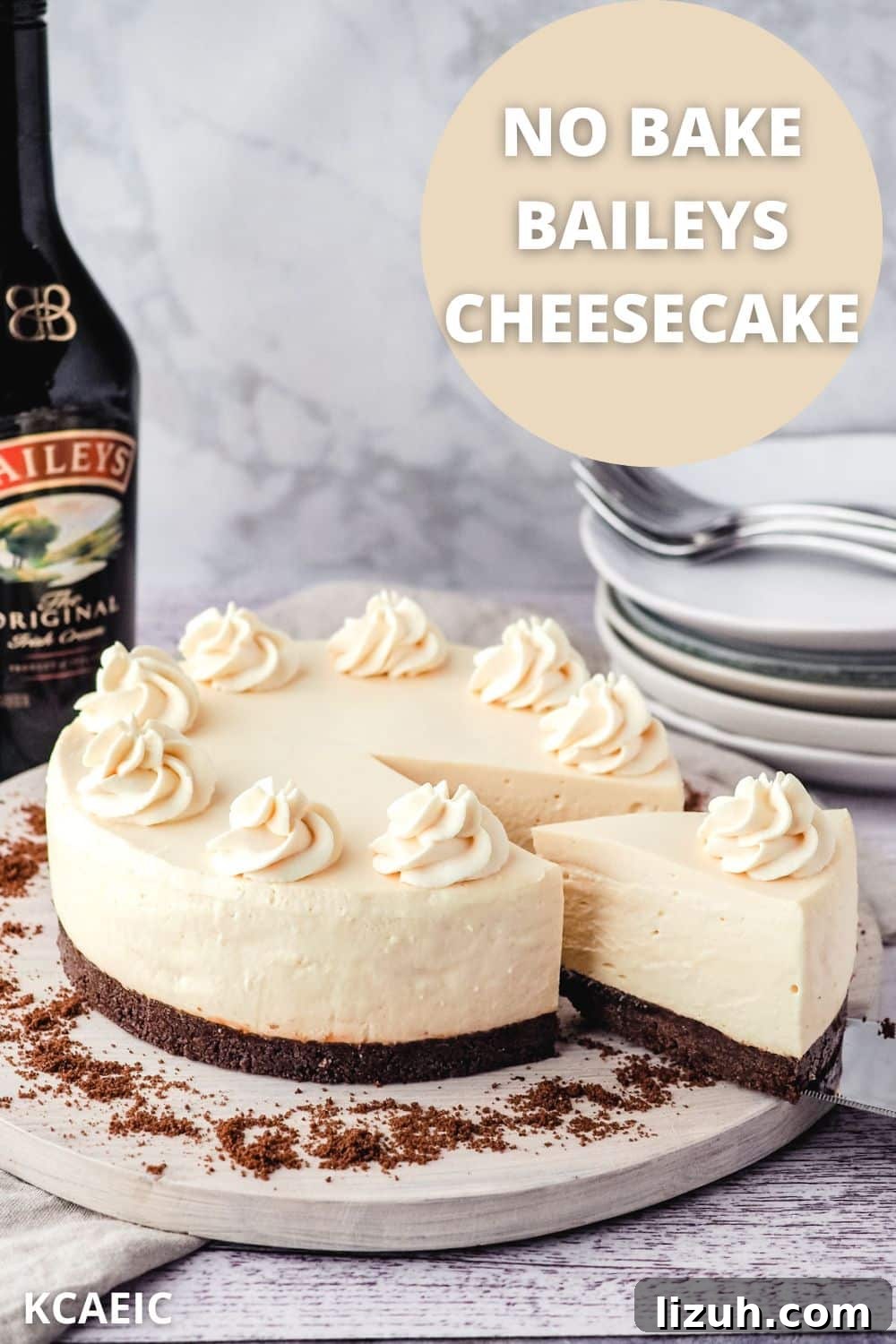 No-Bake Baileys Cheesecake Recipe: Creamy Irish Cream Dessert 11 Removing a slice of Baileys cheesecake.