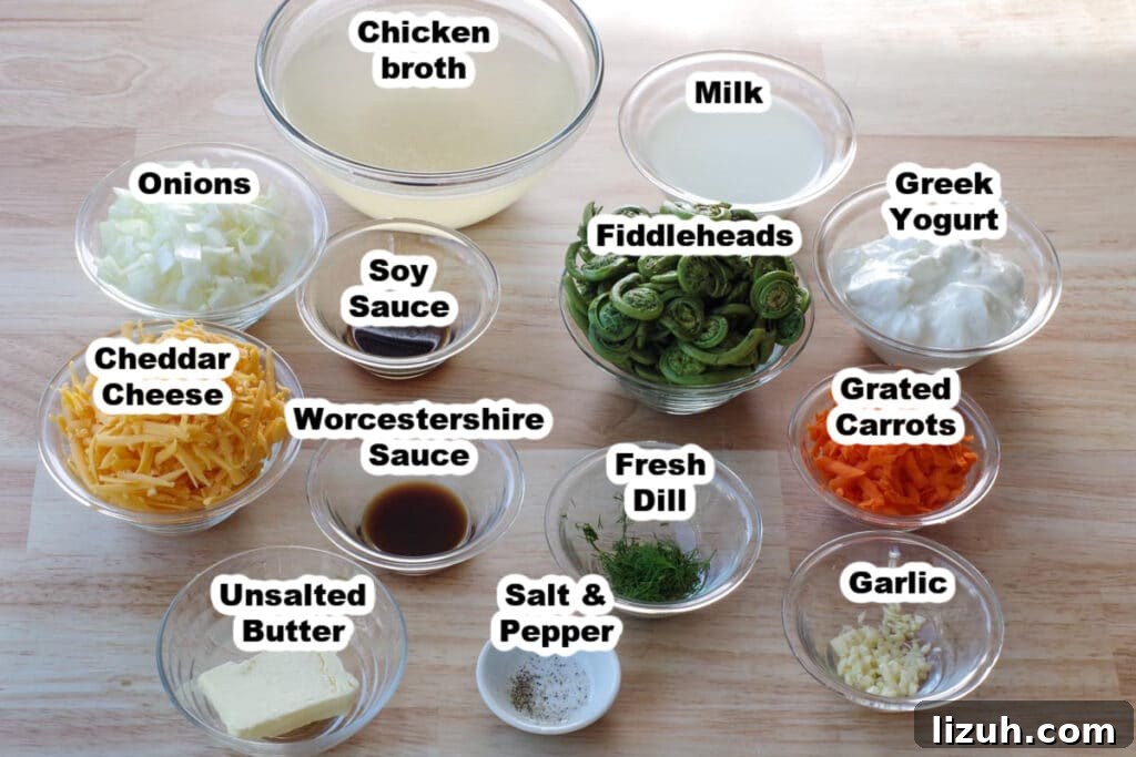 Creamy Fiddlehead and Cheese Soup Recipe 3 fiddlehead soup ingredients in glass bowls, labelled, on a faux brown wooden surface