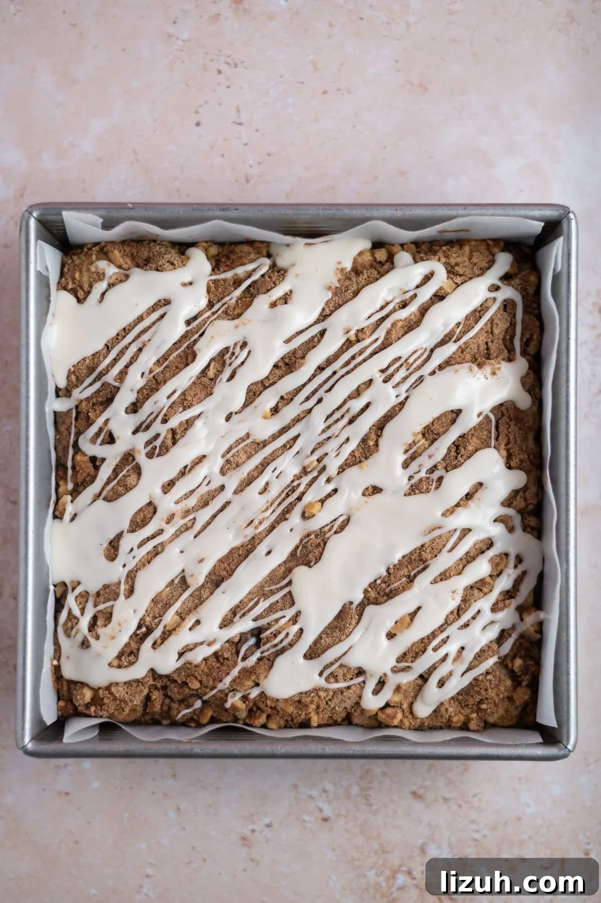 Cinnamon Walnut Coffee Cake Recipe for Weekend Baking 15 icing drizzled overtop cinnamon walnut coffee cake