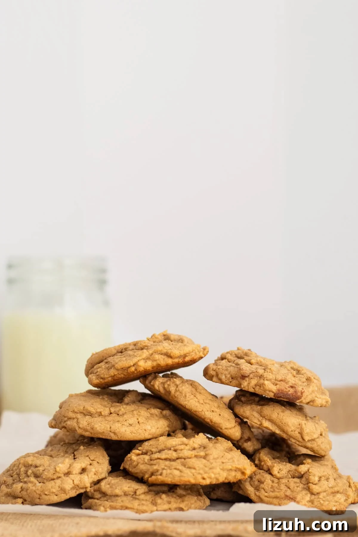 3-Ingredient Spice Cake Mix Cookies Recipe for Quick Treats 2 a pile of spice cake cookies on parchment paper