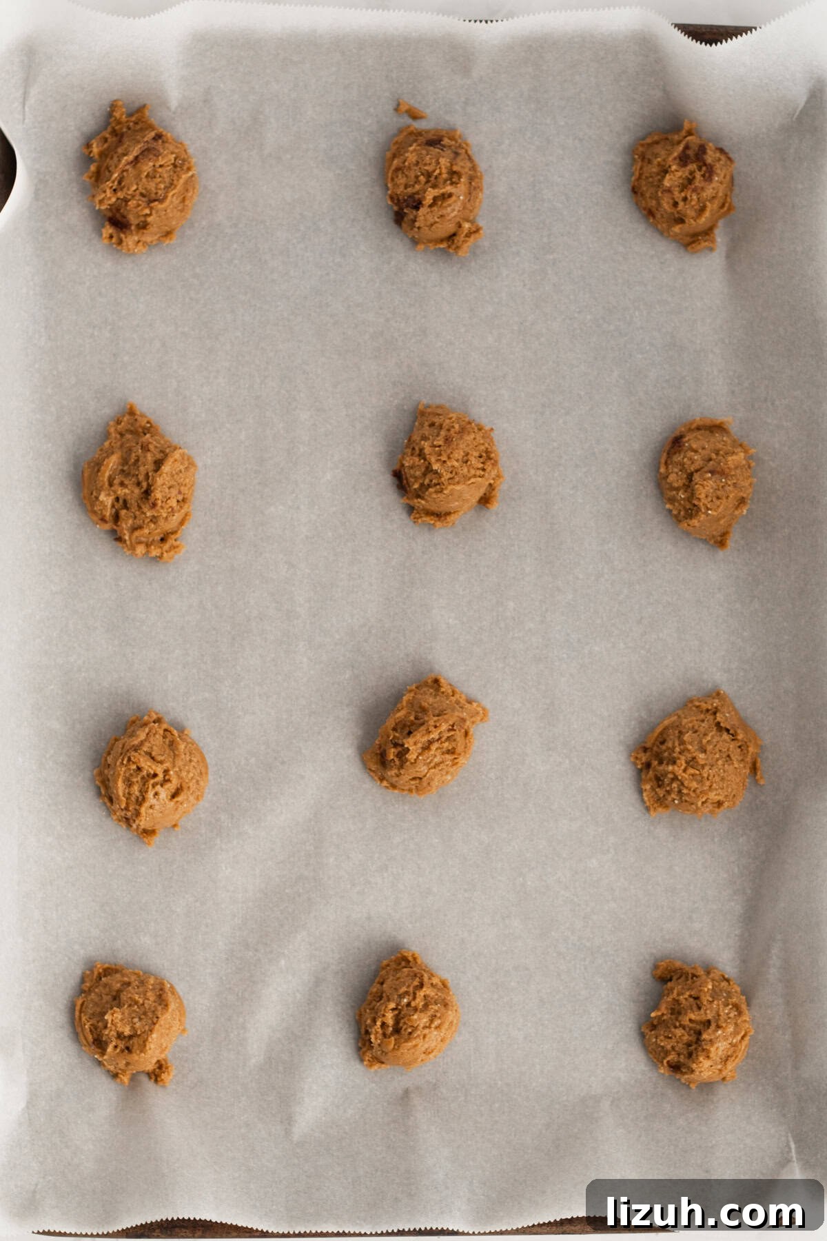 3-Ingredient Spice Cake Mix Cookies Recipe for Quick Treats 8 cookie dough on a parchment lined baking tray