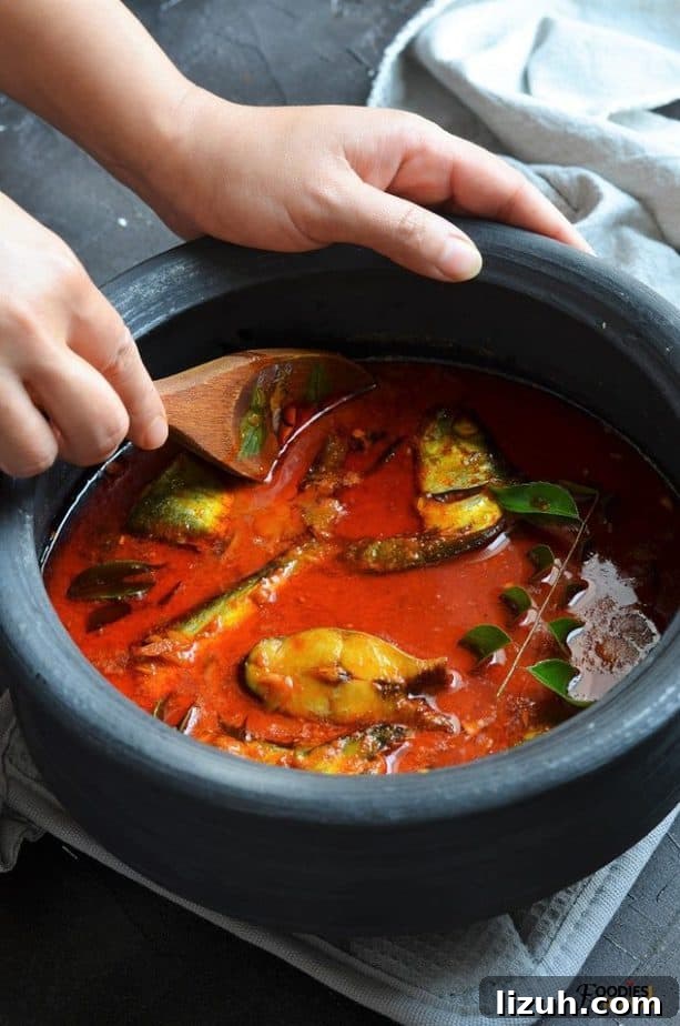 Kerala Coconut Fish Curry Recipe — Authentic Malabar Flavors 4 Kottayam style kerala fish curry with coconut milk in a manchatti