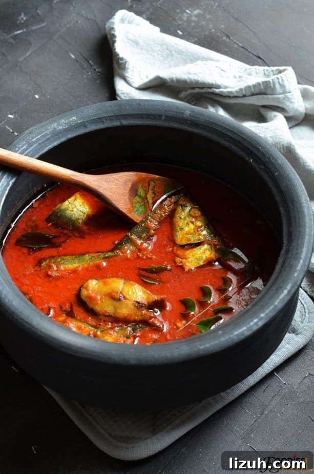 Kerala Coconut Fish Curry Recipe — Authentic Malabar Flavors 5 Spicy Indian kerala fish curry restaurant style in an earthen pot