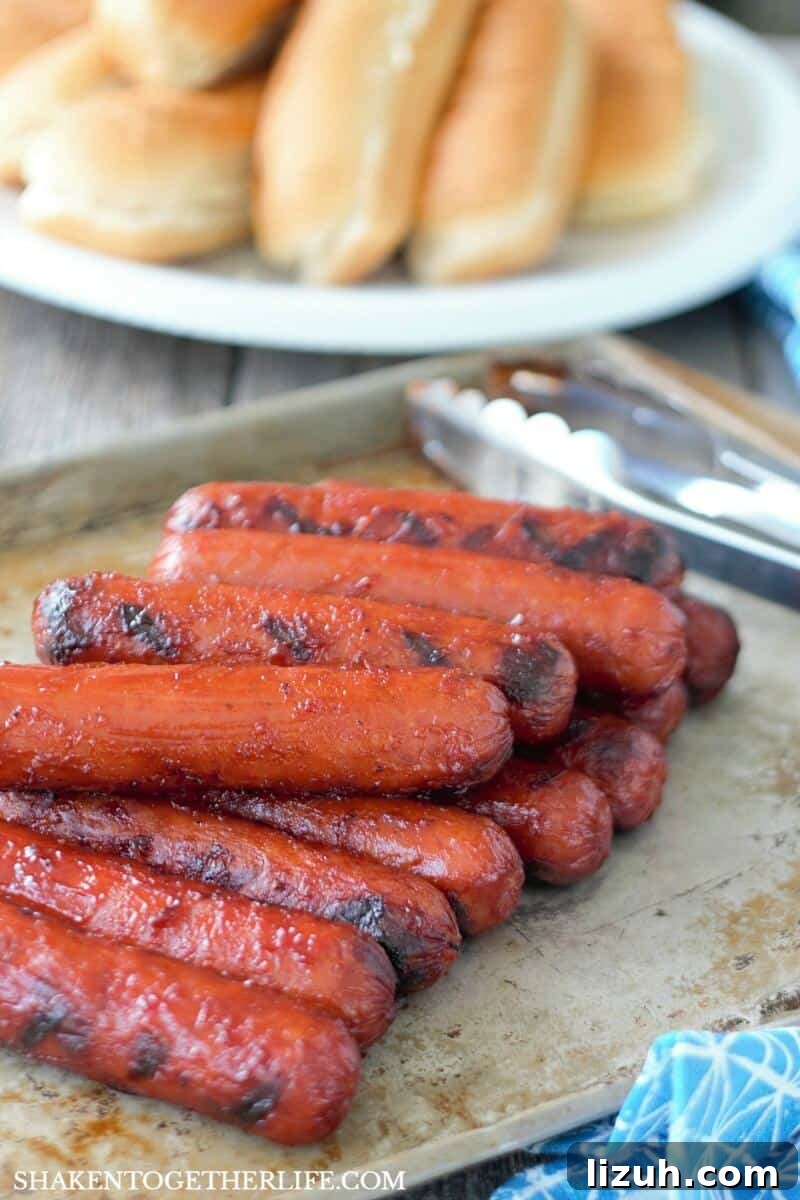 Grilled BBQ Glazed Smoked Sausage on baking sheet