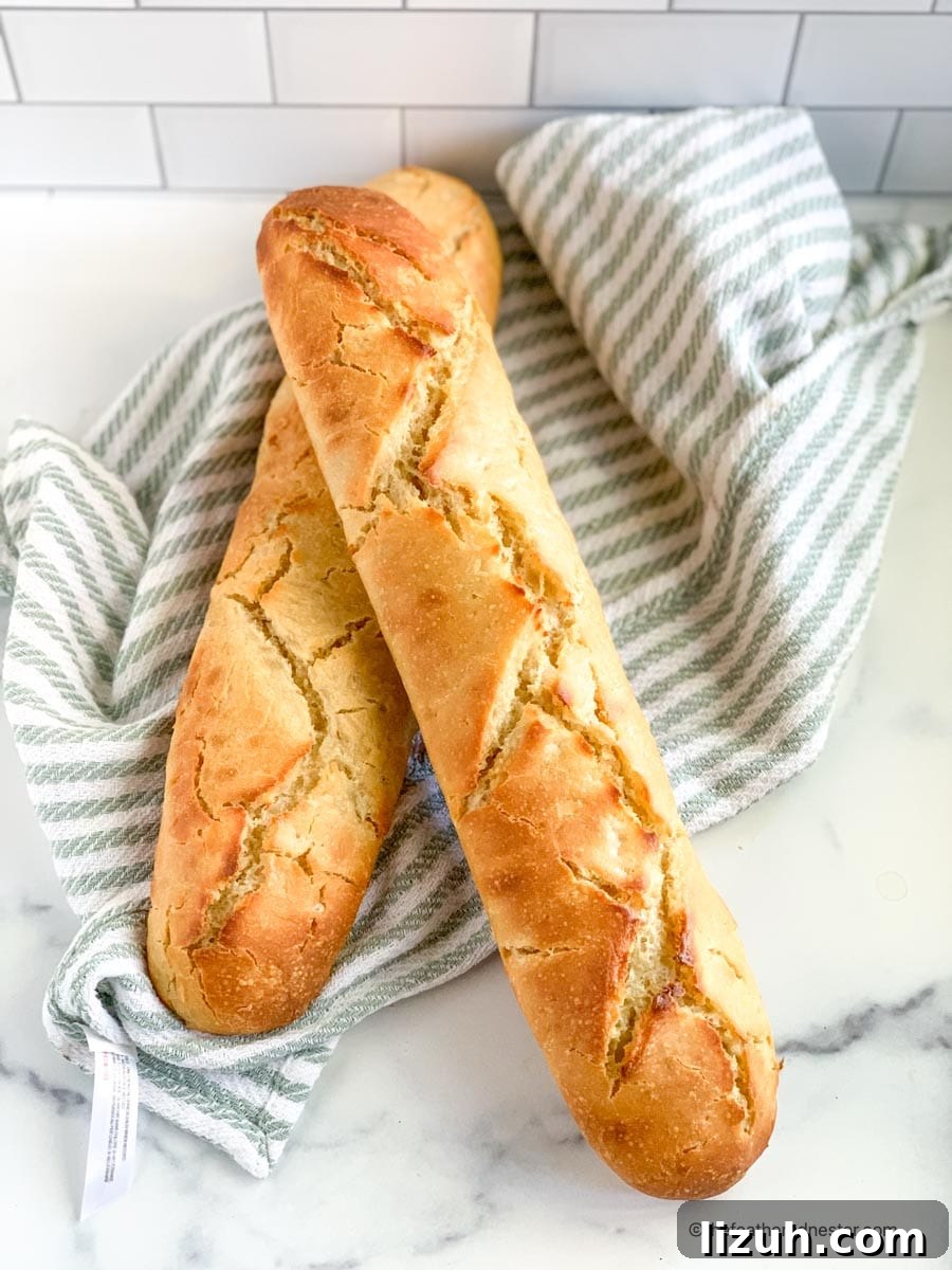 Crisp-Crust Sourdough French Bread Recipe for Rustic Loaves 6 Freshly bakes loaves of French sourdough bread.