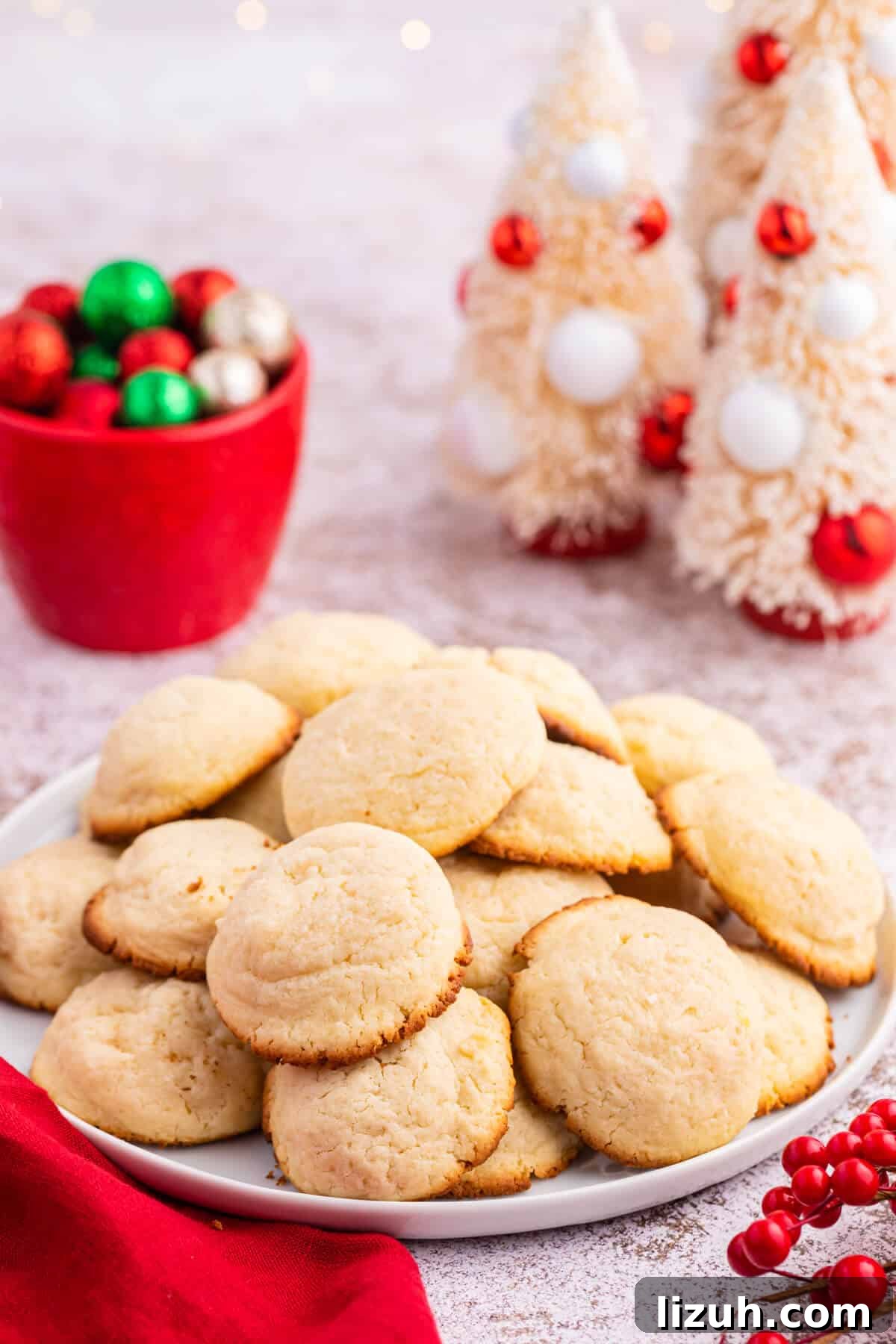 Soft and Chewy Cream Cheese Cookies — Simple Homemade Recipe 7 Cookies on a plate.