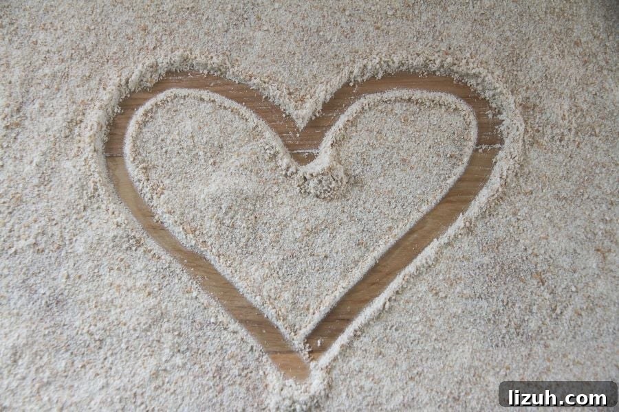 How to Mill Your Own Flour: Essential Tips and Equipment 3 Whole wheat flour with heart drawn in middle