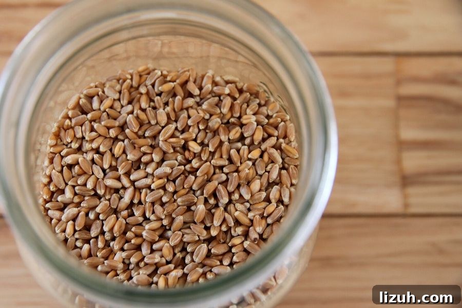 How to Mill Your Own Flour: Essential Tips and Equipment 4 A glass jar of whole wheat berries