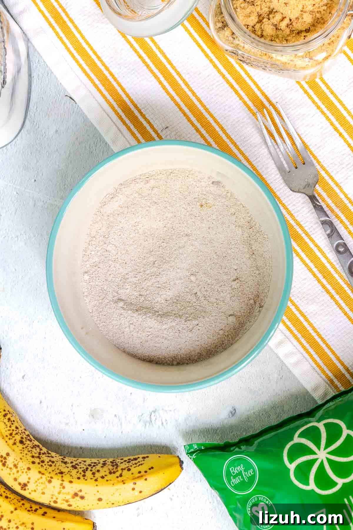 Moist Banana Sour Cream Coffee Cake Recipe for Breakfast 11 The dry ingredients of the crumb topping are mixed together in a small bowl