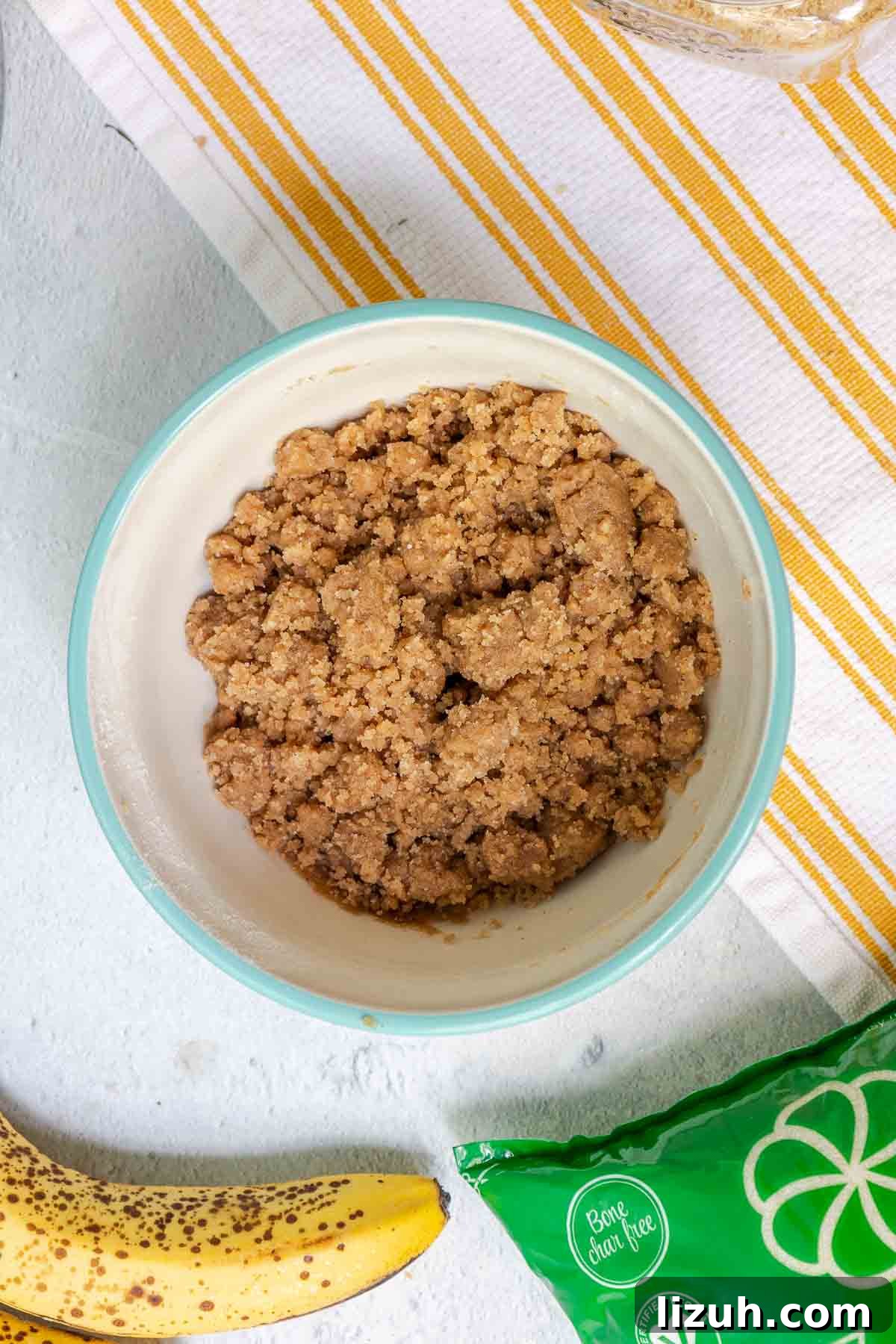 Moist Banana Sour Cream Coffee Cake Recipe for Breakfast 12 The crumble topping mixture has a mix of large and small crumbs