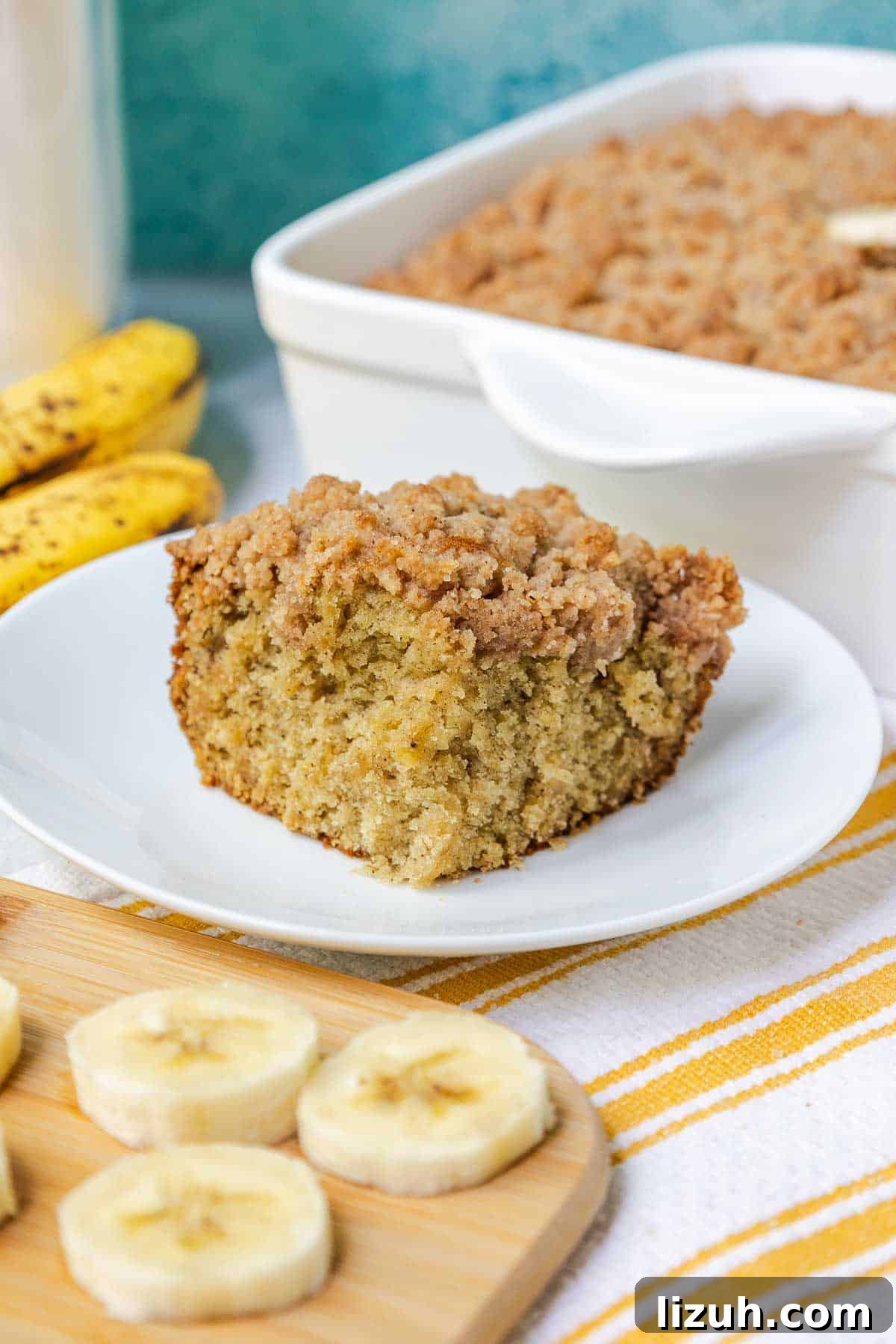 Moist Banana Sour Cream Coffee Cake Recipe for Breakfast 15 Slice of banana coffee cake with crumble topping
