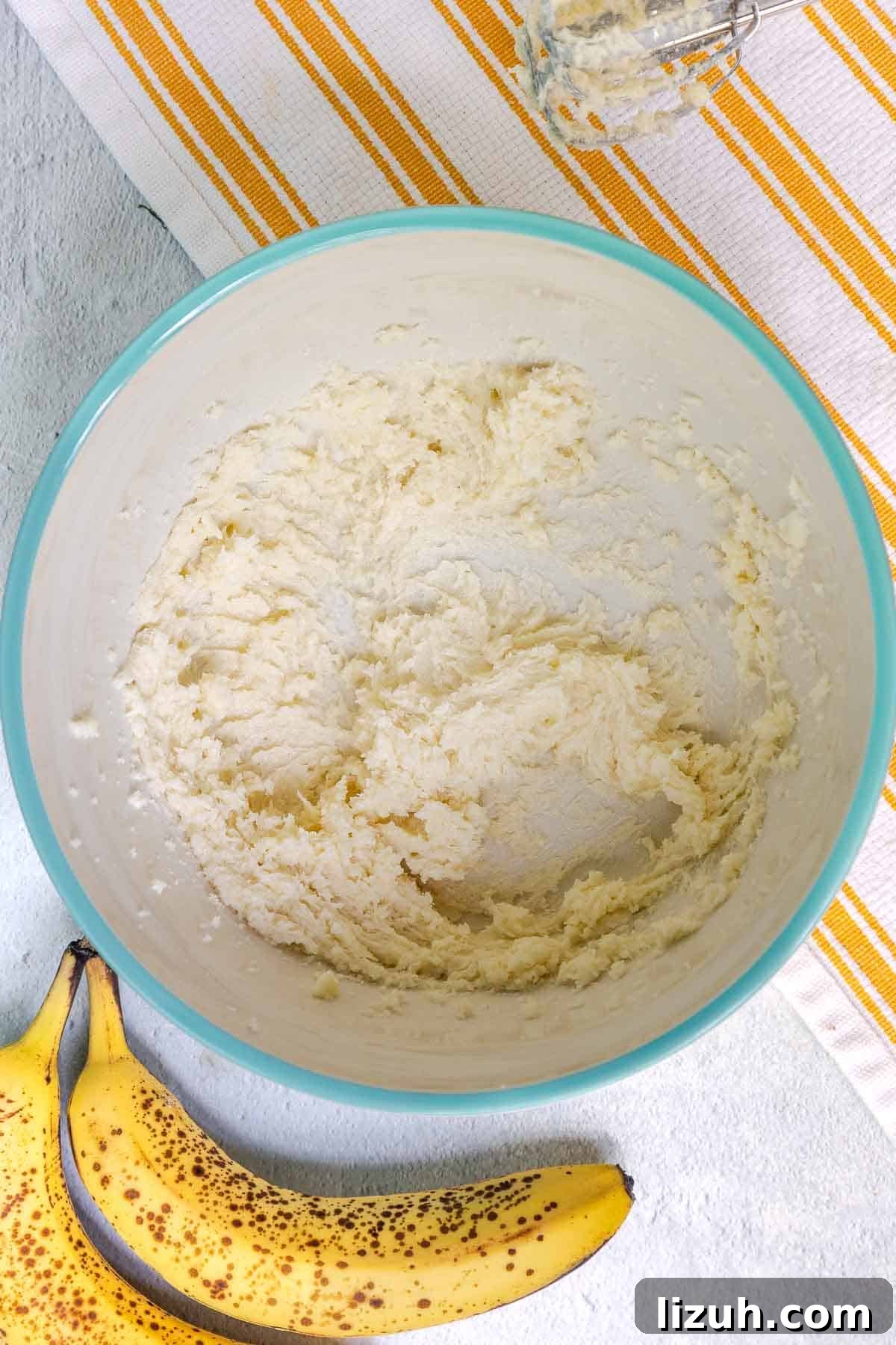 Moist Banana Sour Cream Coffee Cake Recipe for Breakfast 6 The sugar is creamed into the softened butter until light and fluffy