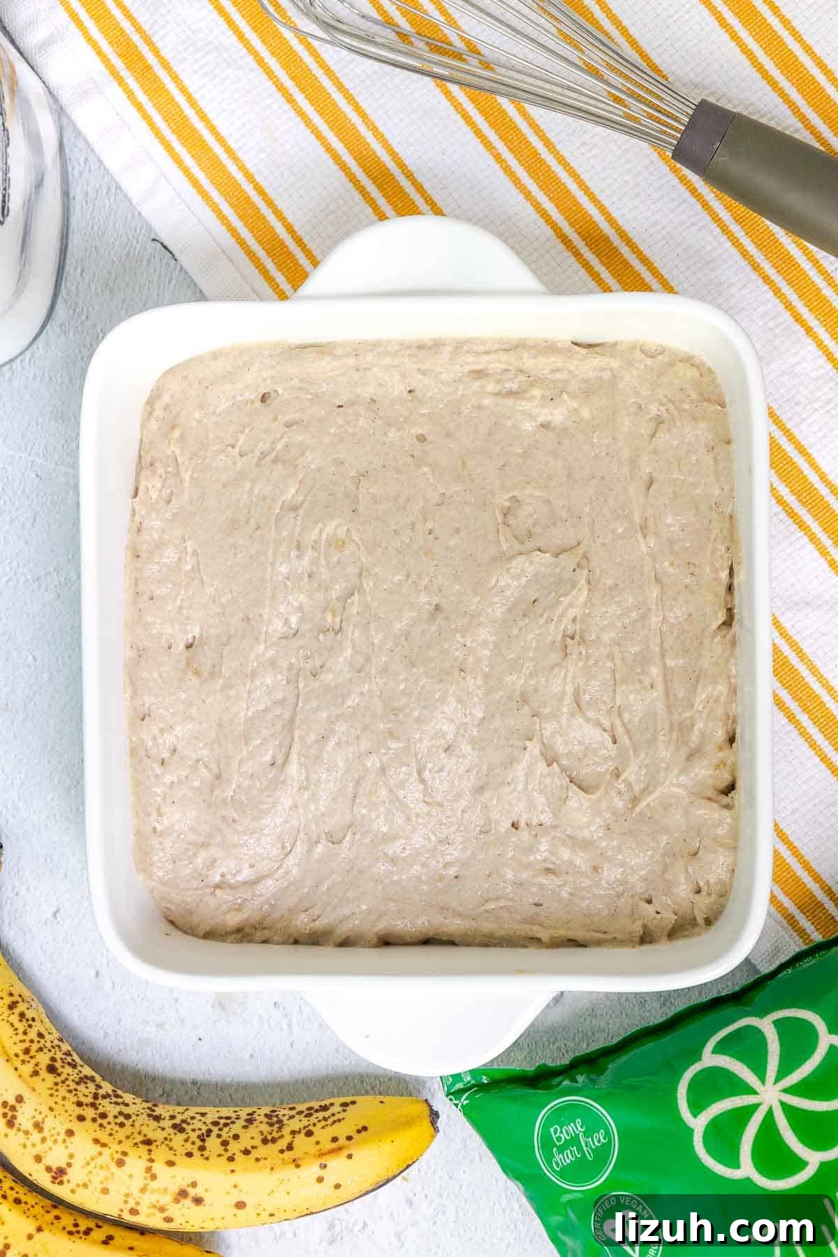 Moist Banana Sour Cream Coffee Cake Recipe for Breakfast 10 Banana cake batter spread evenly in an 8x8 baking dish