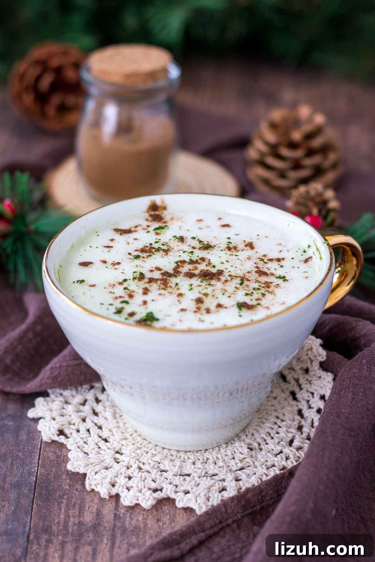 Gingerbread Matcha Latte Recipe — Festive Green Tea Drink 2 Gingerbread Matcha Latte served in a white cup