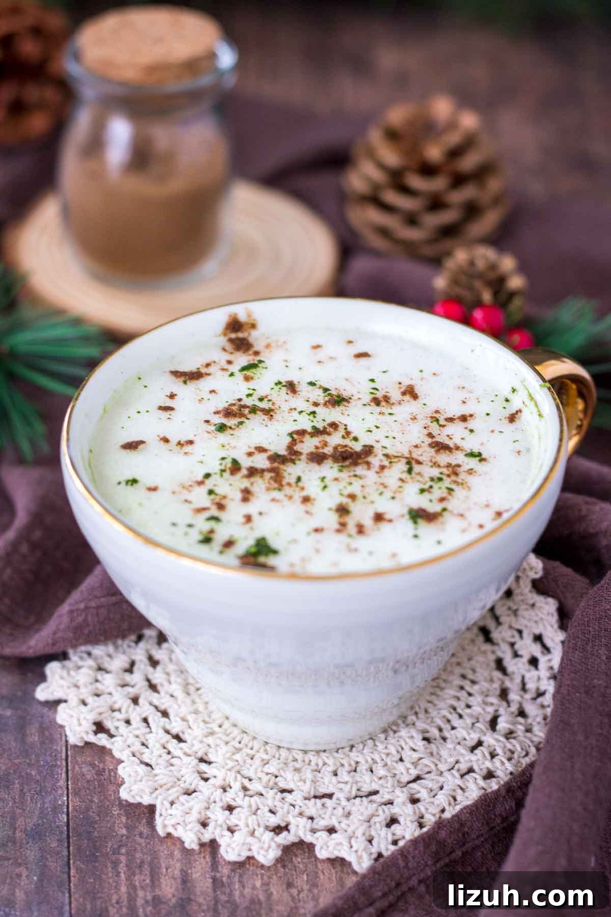 Gingerbread Matcha Latte Recipe — Festive Green Tea Drink 3 Gingerbread Matcha Latte served in a white cup