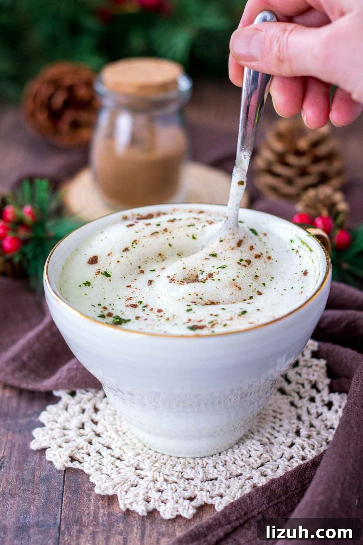 Gingerbread Matcha Latte Recipe — Festive Green Tea Drink 7 Gingerbread Matcha Latte served in a white cup