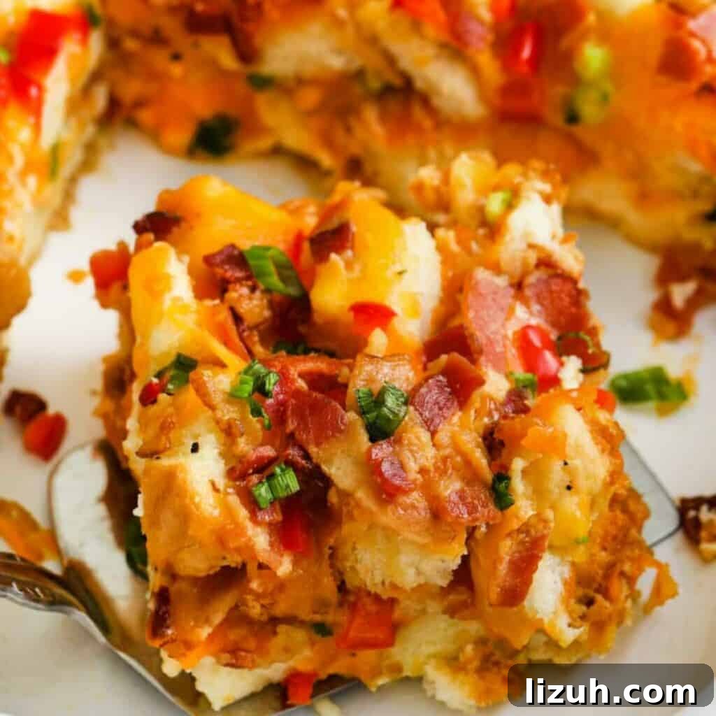 41 Perfect Side Dishes to Serve with Biscuits and Gravy 17 a yummy looking slice of bacon breakfast casserole on a plate.