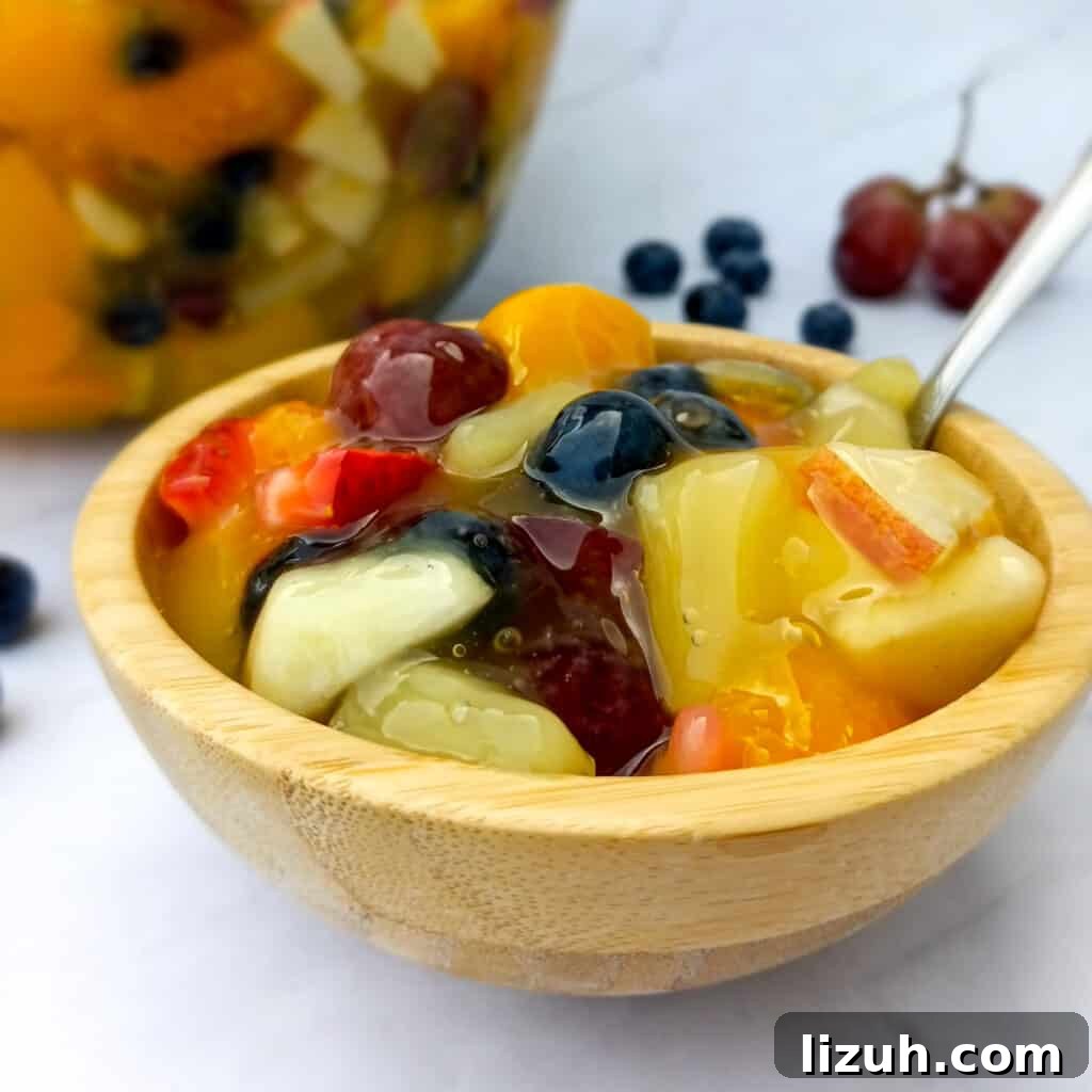 41 Perfect Side Dishes to Serve with Biscuits and Gravy 19 Amish fruit salad in a bowl and a large bowl of fruit salad in the background