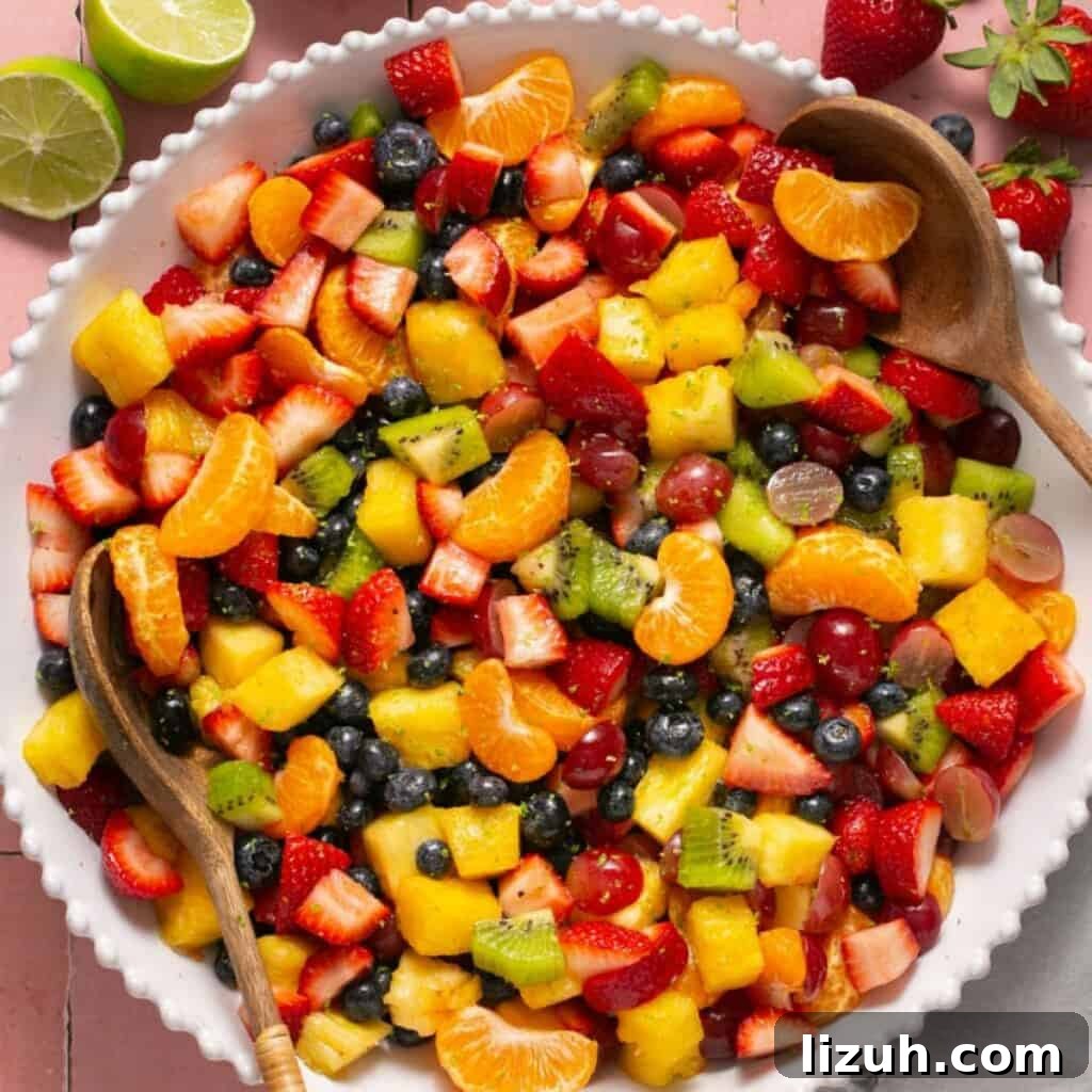 41 Perfect Side Dishes to Serve with Biscuits and Gravy 22 a large bowl of rainbow fruit salad with lime dressing.