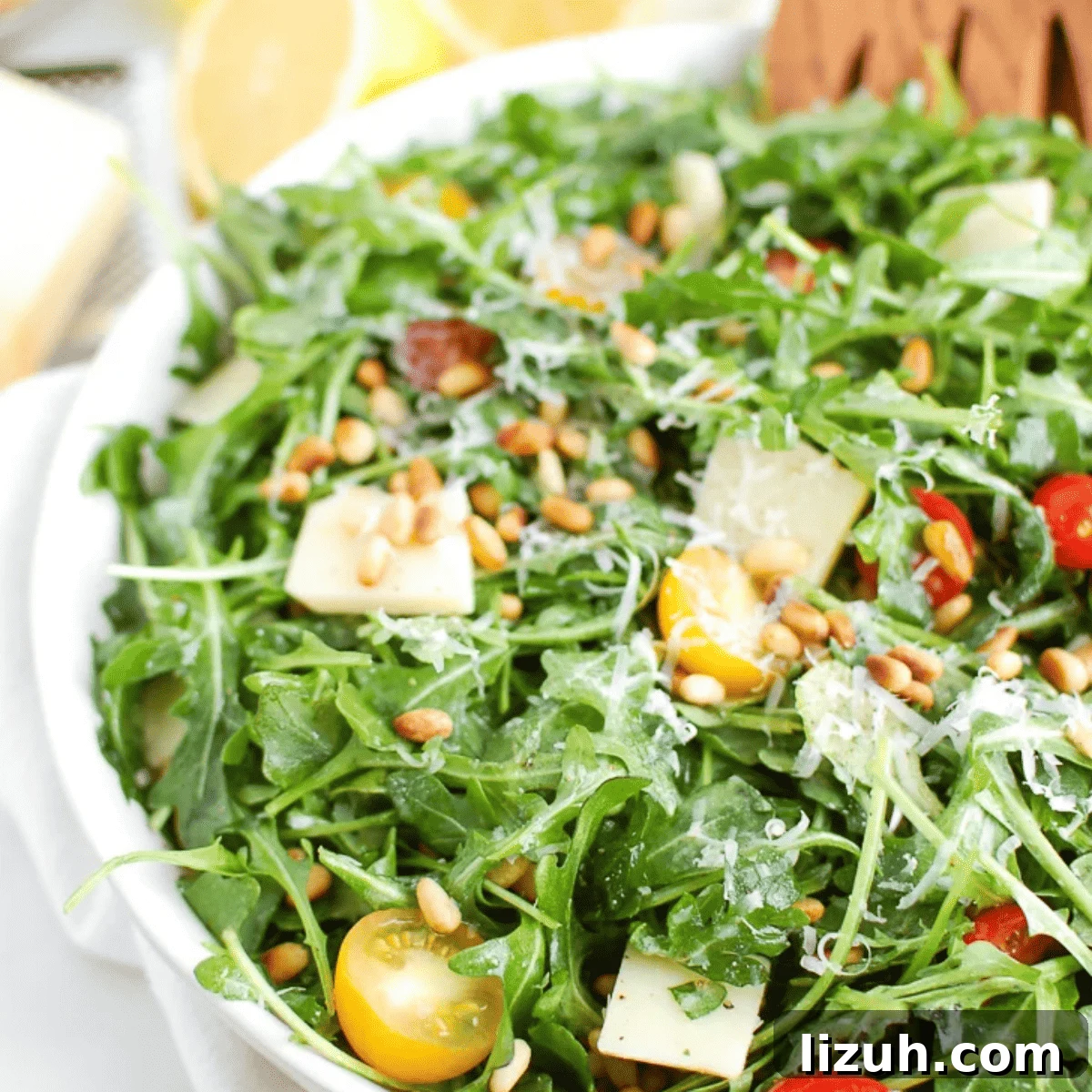 41 Perfect Side Dishes to Serve with Biscuits and Gravy 32 a bowl of arugula salad with lemon dressing.