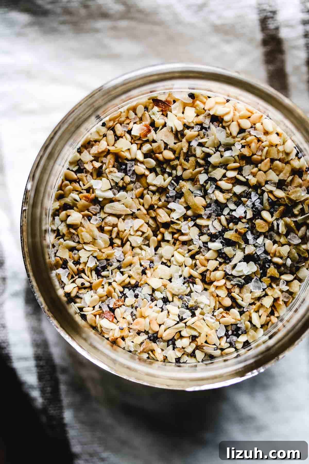 Is Everything Bagel Seasoning Gluten Free? Homemade Recipe Included 4 Overhead view of jar with everything bagel seasoning.