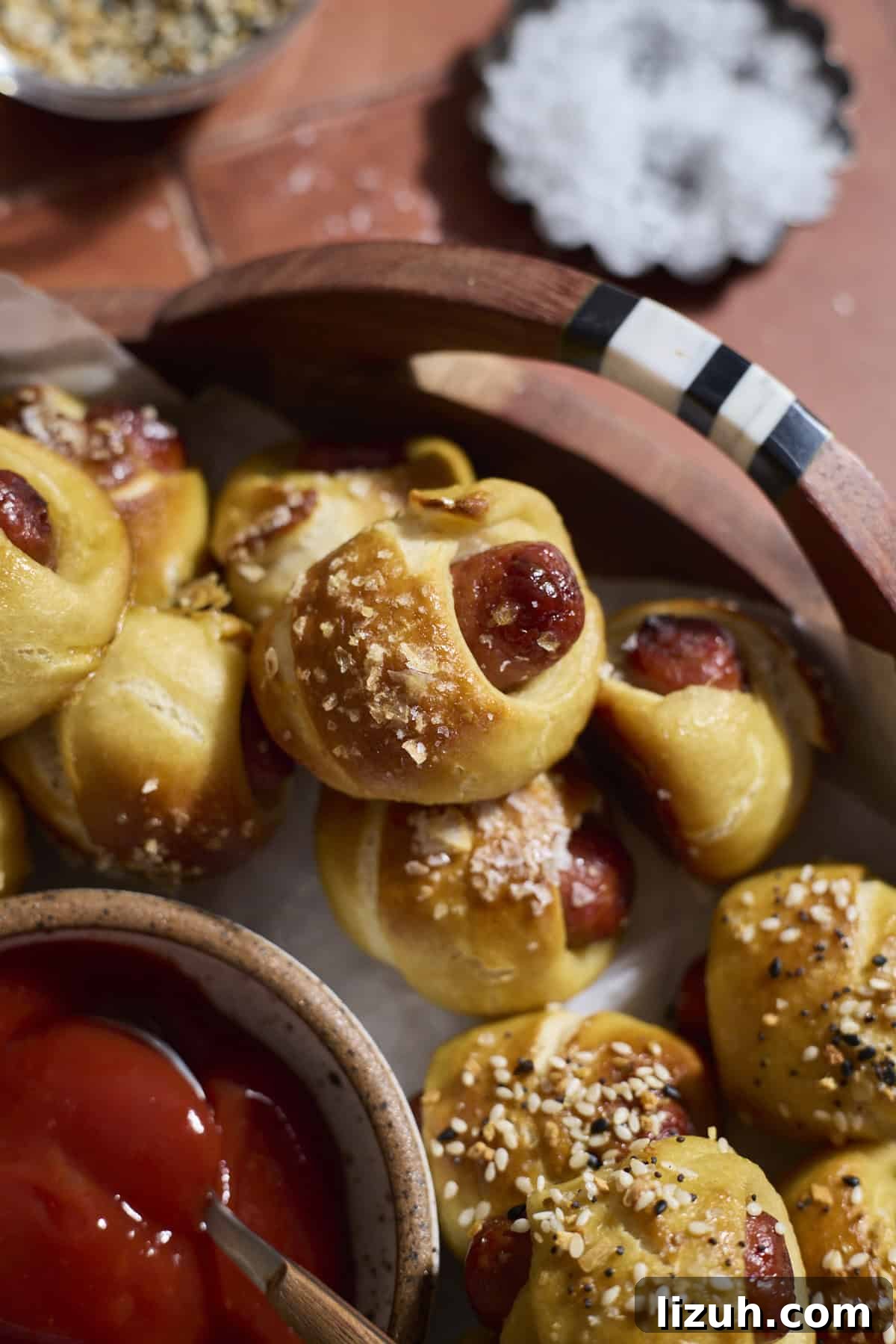 Sourdough Discard Pretzel Pigs in a Blanket Recipe 2 A platter of Sourdough Discard Pretzel Pigs in a Blanket.