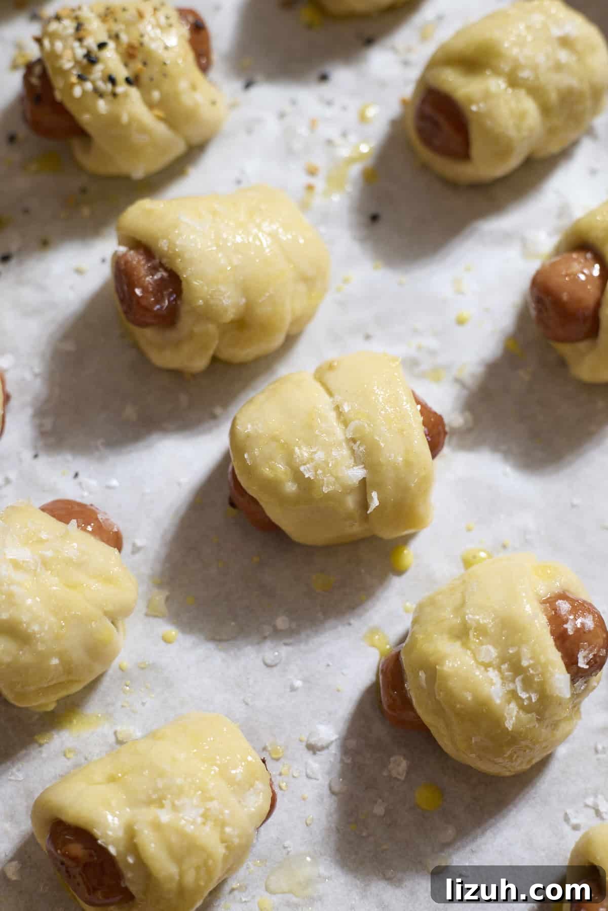 Sourdough Discard Pretzel Pigs in a Blanket Recipe 11 Pigs in a blanket ready to bake.