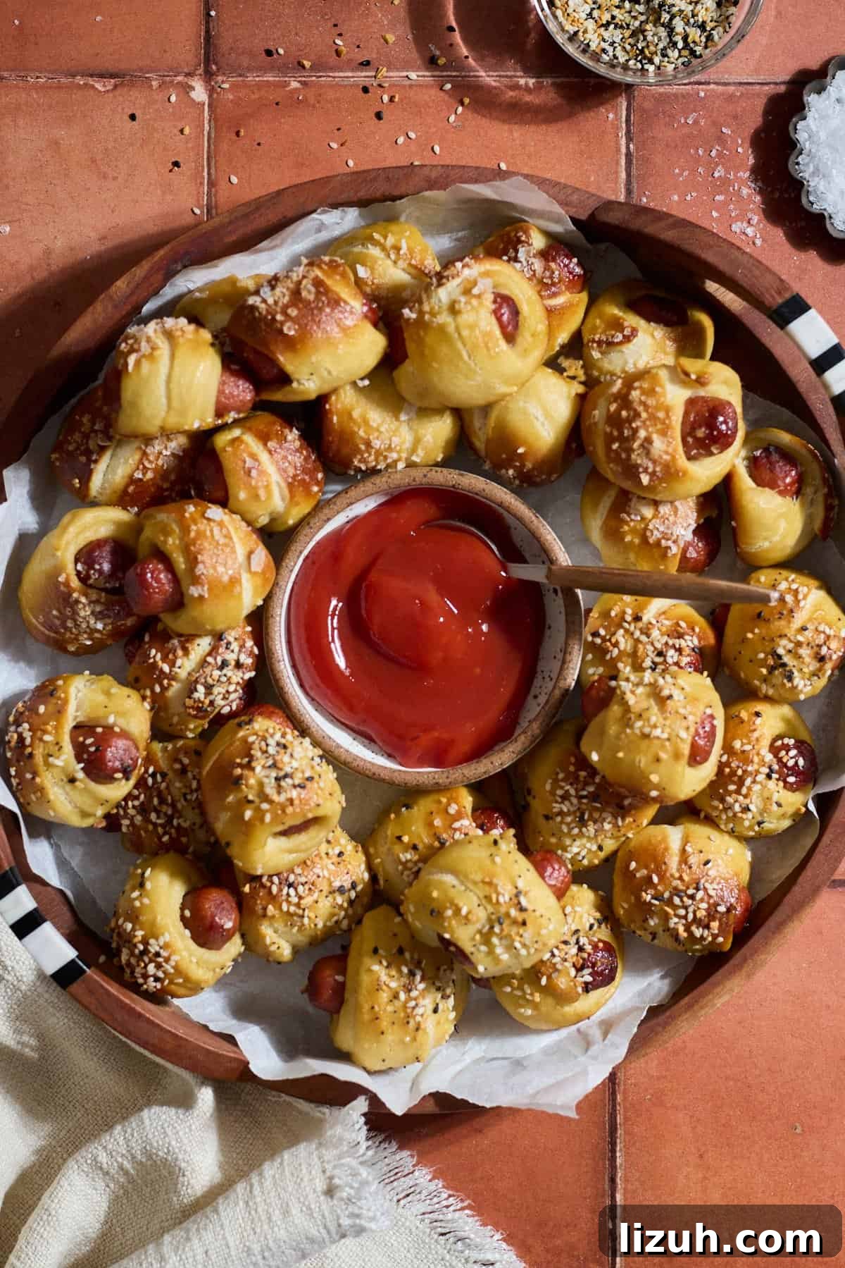 Sourdough Discard Pretzel Pigs in a Blanket Recipe 12 A platter of Sourdough Discard Pretzel Pigs in a Blanket.