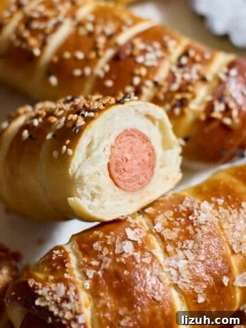 Sourdough Discard Pretzel-Wrapped Hot Dogs in a pile.