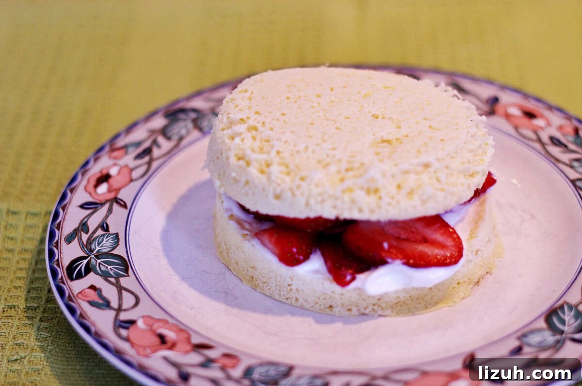 Paleo Strawberry Lemon Shortcake Recipe for Fresh Summer Dessert 6 Adding shortcake half on top.