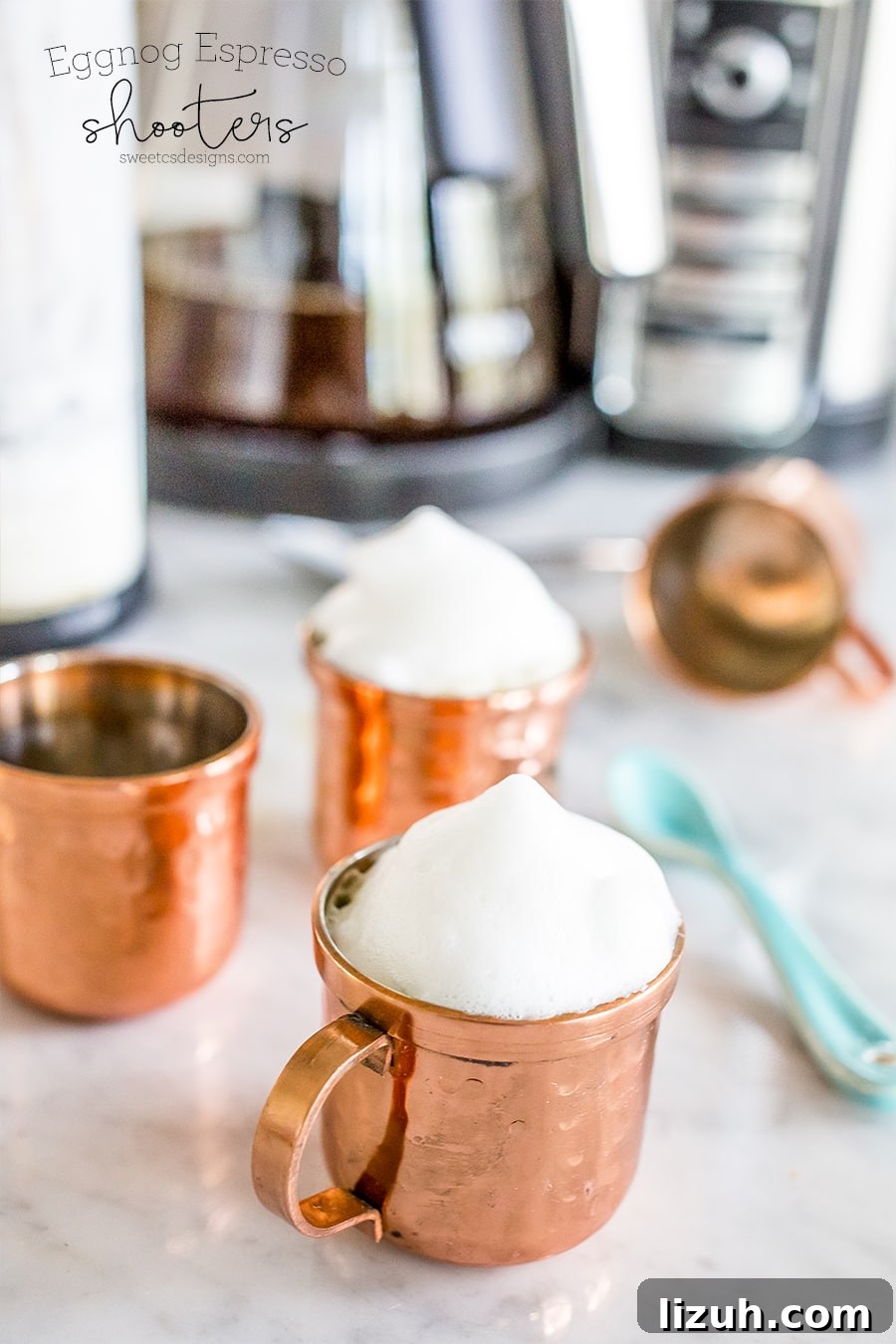 Eggnog Espresso Shooters: Holiday Coffee Cocktail Recipe 4 copper small mug with milk foam on it