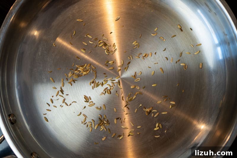 Toasting the fennel seeds