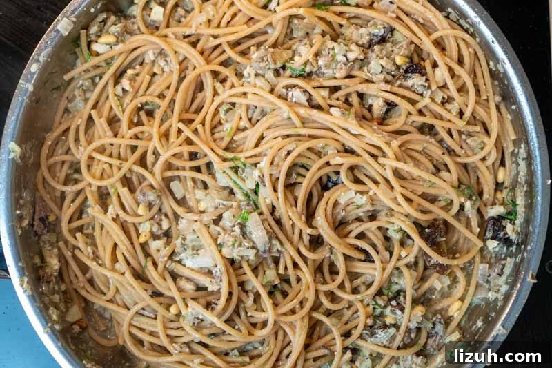 Stirring in the pasta