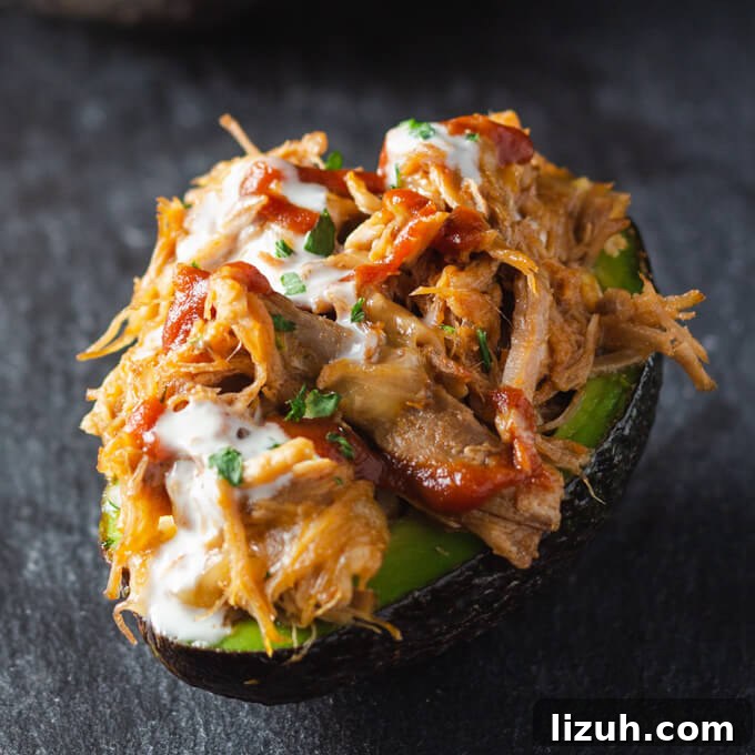 Keto Pulled Pork Stuffed Avocado Boats: Low-Carb Recipe 5 Pulled Pork Stuffed Avocado Boats