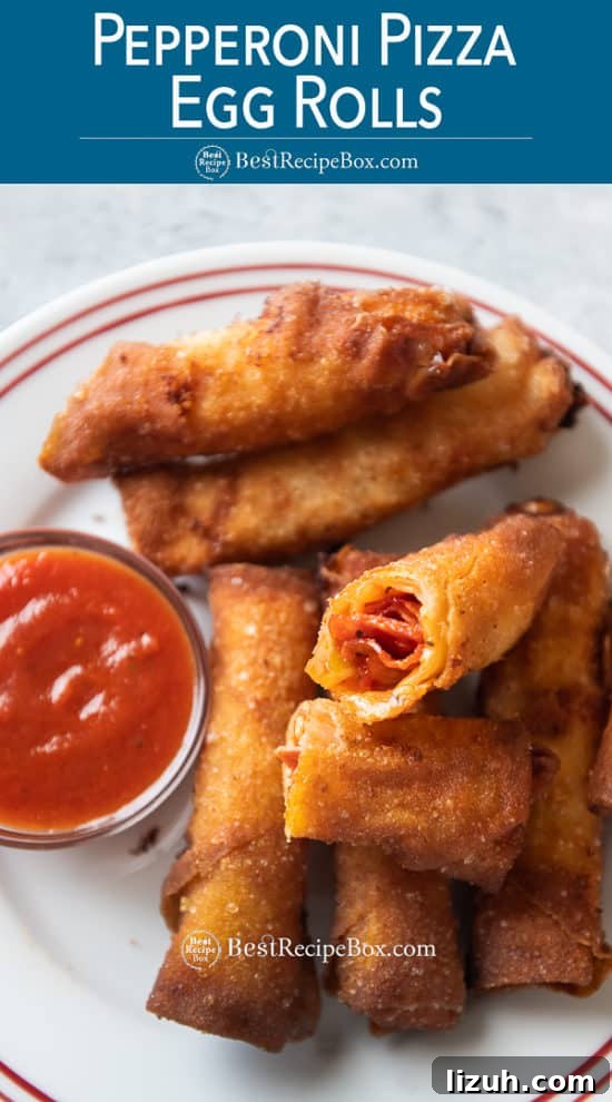 Plate of egg rolls filled with pepperoni pizza toppings on a plate 
