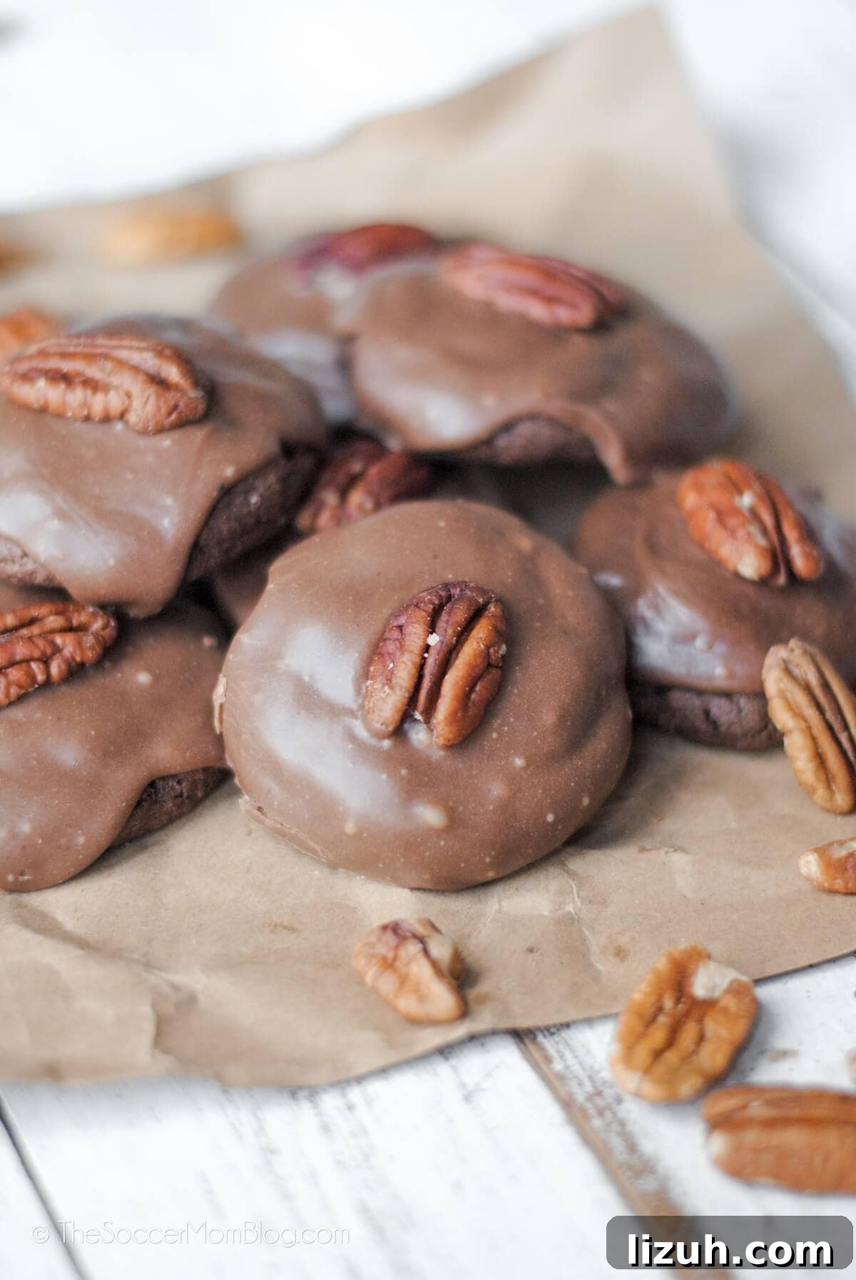 Texas Sheet Cake Cookies Recipe — Decadent Chocolate Cookie Bars 7 Texas sheet cake cookies on brown paper.