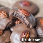 Texas Sheet Cake Cookies Recipe — Decadent Chocolate Cookie Bars 8 stack of Texas sheet cake cookies, top cookie with bite missing