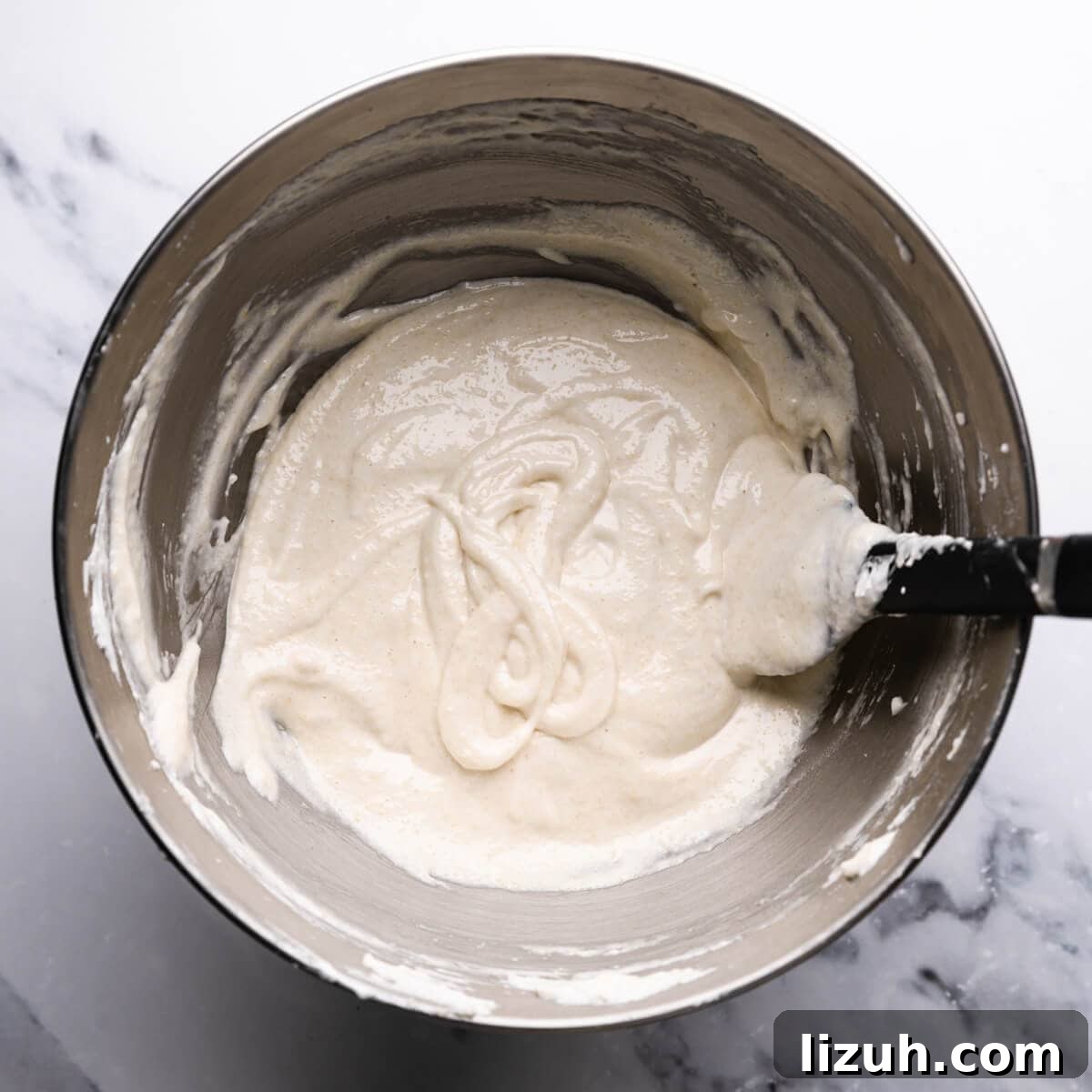 Irresistible Salted Caramel Macarons Recipe for Perfect Results 7 mixing bowl with macaron batter.