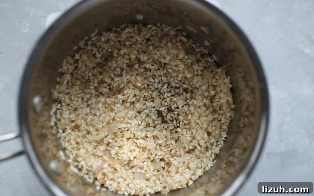 Risotto rice in a pot on a table.