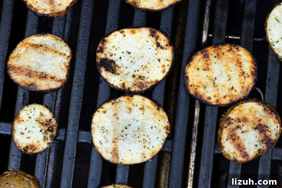 Crispy Grilled Sliced Potatoes Recipe for Summer BBQs 6 Grilling 6 thin sliced potatoes on propane grill
