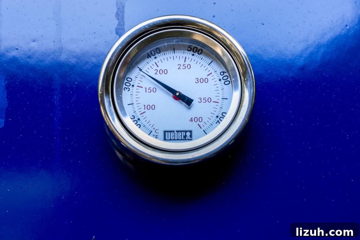Crispy Grilled Sliced Potatoes Recipe for Summer BBQs 8 Grill thermometer showing preheated to 350°F.