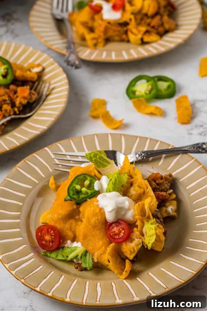 Plated walking taco casserole in individual portions.