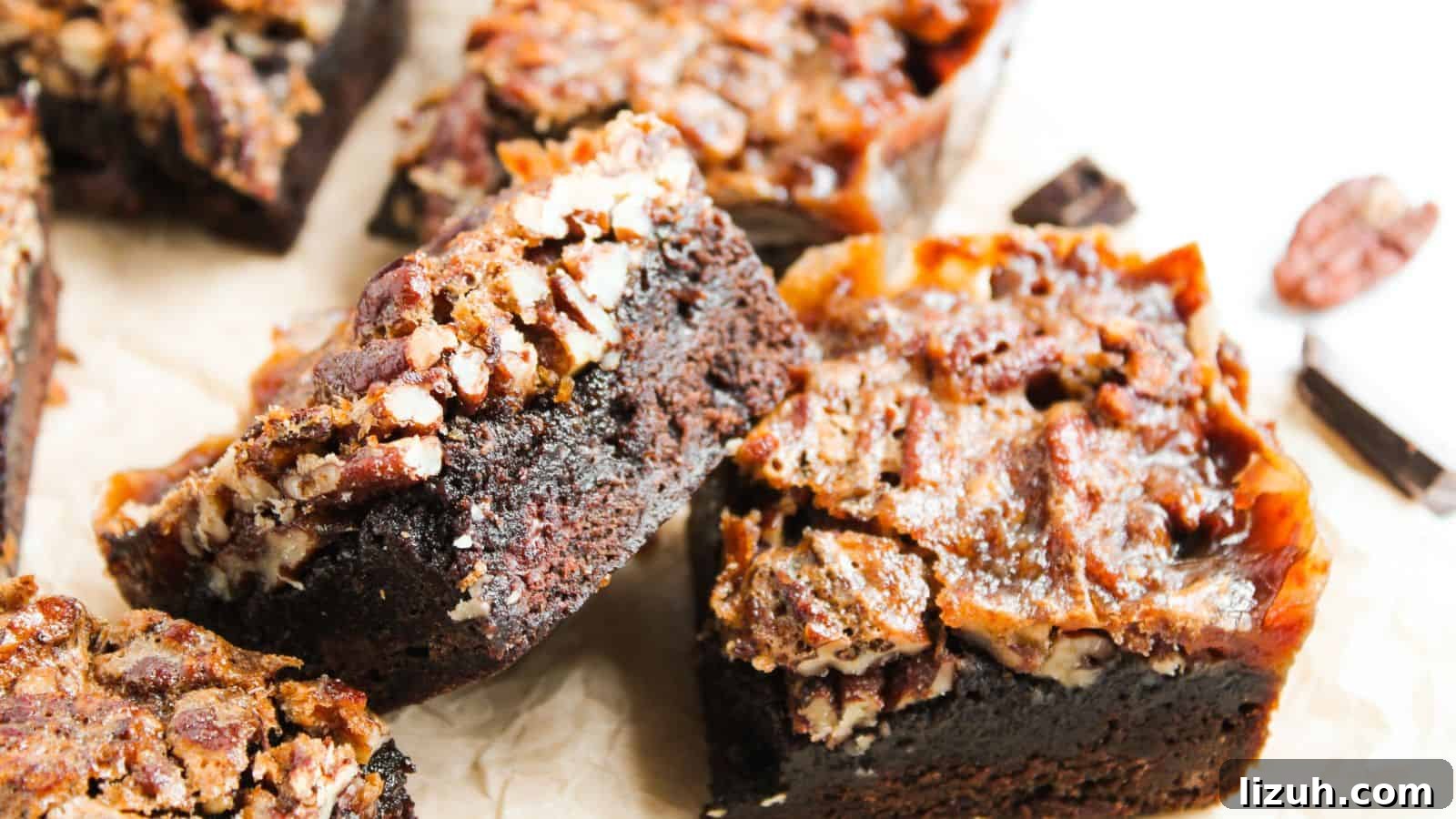 35 Game-Day Recipes to Win Your Season’s Food Lineup 11 Close-up of several chocolate brownies topped with pecans on a parchment surface.